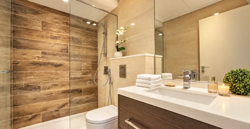 Yasmin bathroom with walk-in shower, wood-look tiles and vanity
